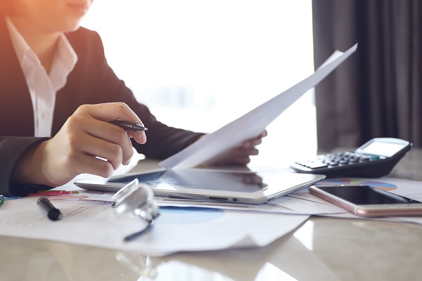 woman with financials - photo